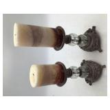 2 pillar candle holders with candles
