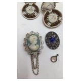 Assortment of Brooches and Necklace Pendants