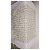 Vintage Baby Quilt with cross stitching animals.