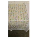 Vintage Baby Quilt with cross stitching animals.