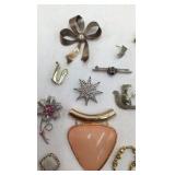 Assortment of Brooches and Necklace Pendants
