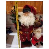 Collection of 4 Vintage Santa Claus Figurines with Red Outfits