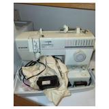 Singer Sewing Machine with Case, Thread, Notions, and Accessories Lot