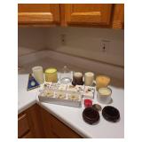 Collection of Decorative Candles, Matches, and Kither & Co. Blue Table Clock