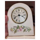 Decorative Home Decor Assortment Including Carved Wooden Box, Aynsley Clock, Candles, and Collectibles