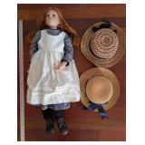 Doll With White Pinafore Dress And Two Straw Hats