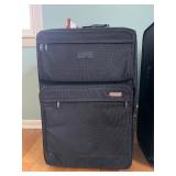 TravelPro 2-Piece Black Luggage Set - Carry-On & Upright Rolling Suitcases