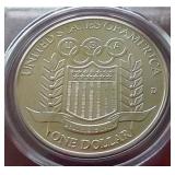 1992-D Olympic Commemorative Silver Dollar With Nolan Ryan Model Card