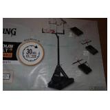 Spalding Momentus EX Asssembly 54" Acrylic Portable Basketball Hoop