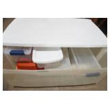 2 plastic drawer containers filled with plastic storage containers