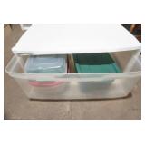 2 plastic drawer containers filled with plastic storage containers