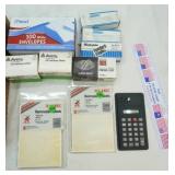 New/Unused staples, removable labels, envelopes, roll address labels, calculator