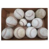Softballs, 1 baseball, 1 golf ball