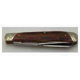 Vintage Rough Ryder Double Bladed Pocket Knife With Red Bone handle