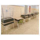 by Rm 204 - 17 flip top desks and 1 chair