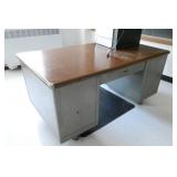 by Rm 204 -  steel desk and floor mat