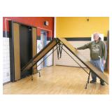 Rm 202 - murphy bed style cafeteria tables 7 ft x 30 in tables folds out to 14 ft - brown