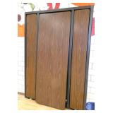 Rm 202 - murphy bed style cafeteria tables 7 ft x 30 in tables folds out to 14 ft - walnut