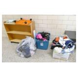 By kitchen - Bench, bookcase, lost and found clothes