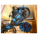 ECFE - group of headphones, books on tape and tape player