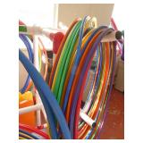 GymS- Stand full of hula hoops