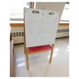 Rm 114 - chalkboard/whiteboard easel, bookcases and totes