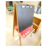Rm 114 - chalkboard/whiteboard easel, bookcases and totes