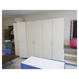 Rm 114 - Wall of cabinetry - 3 cabinets, 2 bookcases and shoe storage