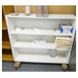 Rm 110 -  Rest of the room, 4 wood bookcases, desk, chairs