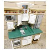 by Rm 110 - play kitchen