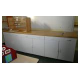Rm 101A - cabinet 9 ft long x 25 deep x 36 tall