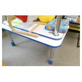 Rm 101A - 4 kids tables, 2 lounge chairs and misc contents
