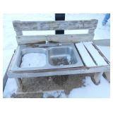 Outside - Double sink sand box with faucets