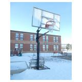 Outside - Adjustable height basketball hoop