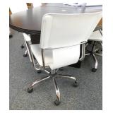 Office - Conference table with 6 leather chairs on wheels