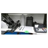 Rm 102 - 2 Shelves with a calculator, heater, bluetooth speaker, phone, tablet and more