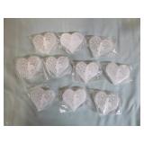 10 Selenite Crystal Hearts with Fairies on them.