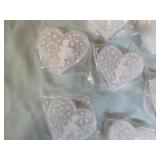 10 Selenite Crystal Hearts with Fairies on them.