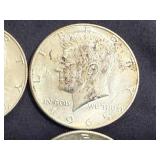 4 1965 Kennedy Half Dollars