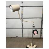 Mobile Medical Exam Light –  Flexible Gooseneck. Bright, shadow-free LED illumination for clinical, dental, or procedural use. Features a 5-wheel base for easy mobility, chrome pole, and adjustable 