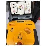 MSRP $2,500! Medtronic Physio-Control LIFEPAK Defibrillator Easy-to-use with voice and graphic prompts. Comes with soft carrying case & hard storage case for supplies. Works However Needs Battery 