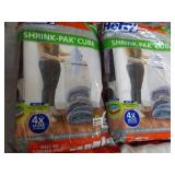 2 Hefty Shrink-Pak Cubes...