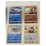 Lot of 8 Holo Pokemon Trading Cards Featuring Arcanine, Barraskewda, Basculegion, Gigalith, Seismitoad, Turtonator, Drednaw, and Greedentnd Greedent Holo
