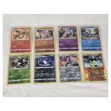 Lot of 8 Holo Pokemon Cards Featuring Flareon, Zarude, Dialga, and Zygarde