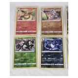 Lot of 8 Holo Pokemon Cards Featuring Flareon, Zarude, Dialga, and Zygarde