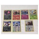 Lot of 7 Pokmon Holo Cards Featuring Yveltal, Magcargo, Xerneas, Beautifly, Krookodile, Bastiodon, and Ursalunaluna with Holo Features and Mixed Types