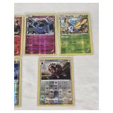 Lot of 7 Pokmon Holo Cards Featuring Yveltal, Magcargo, Xerneas, Beautifly, Krookodile, Bastiodon, and Ursalunaluna with Holo Features and Mixed Types