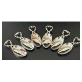 LL - Six Vintage Silver-Tone Dessert Spoons with Ornate Handles