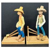 Pair of Hand-Carved Cowboy Figurines