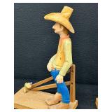 Pair of Hand-Carved Cowboy Figurines